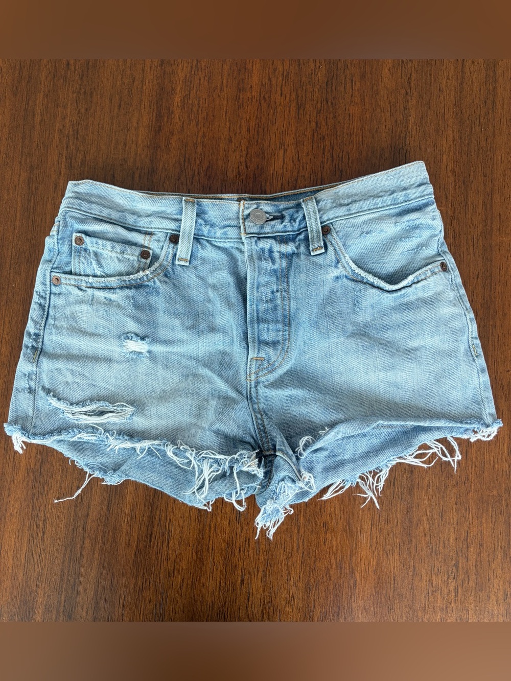 Levi’s Light Blue Distressed 501 Denim Shorts